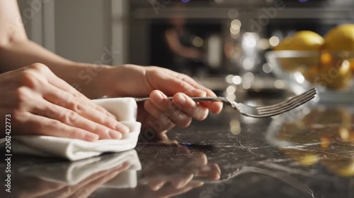 Hand Cleaning Surface in Modern Kitchen Quiet Morning