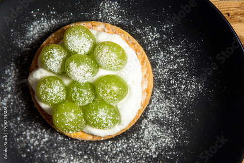 Green grape slice cake on a plate