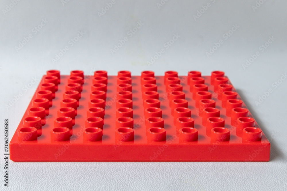 Naklejka premium Front Perspective View Red Square lego duplo base plate toy block brick isolated on white