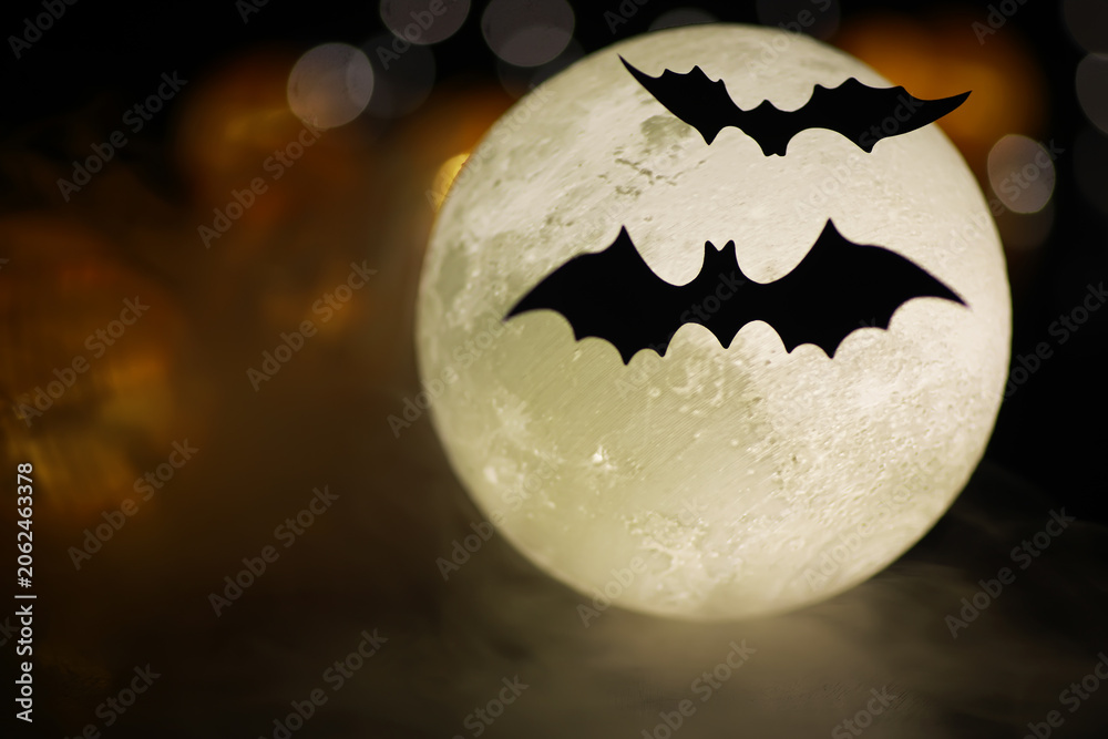 Fototapeta premium Halloween Full Moon with Flying Bats Silhouette on Spooky Night Background