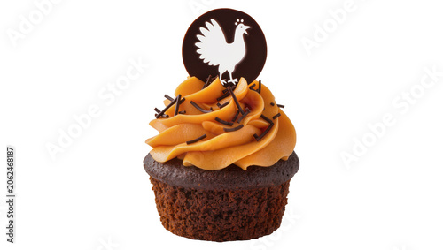 Chocolate cupcake with orange frosting and rooster topper