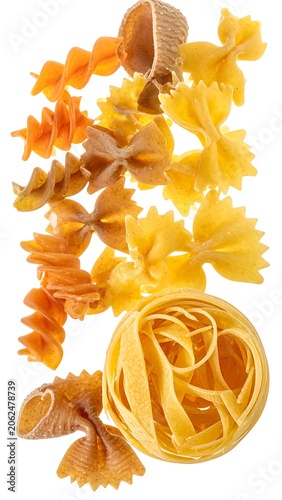 A creative arrangement of various pasta shapes on a white background