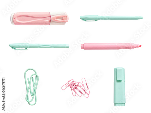 Variety of pastel pink and mint green office stationery and supplies on a transparent background.