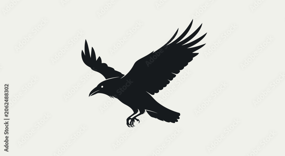 Fototapeta premium Silhouette of a raven soaring against a plain background, wings spread