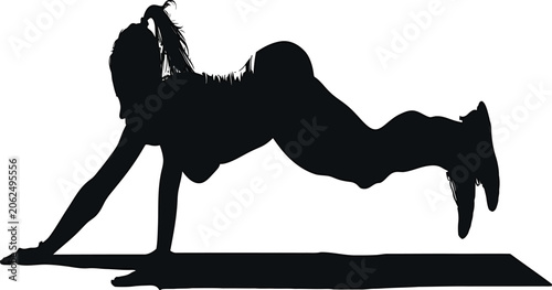 Schilderij op canvas Woman silhouette performs a challenging plank exercise on a mat to build core strength and fitness