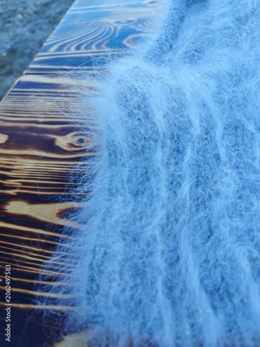 Obraz na plátne Close up texture of a light blue fluffy knitted fabric