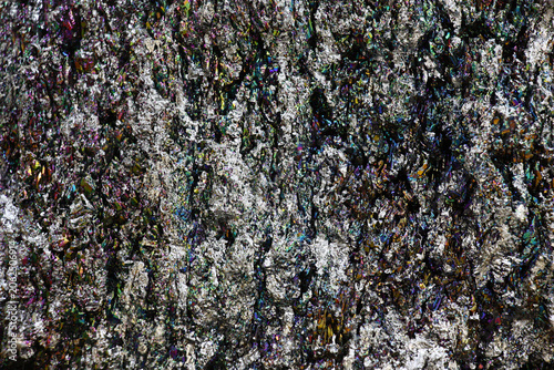 Semi-precious stone. Colorful original abstract surface. Natural color design.