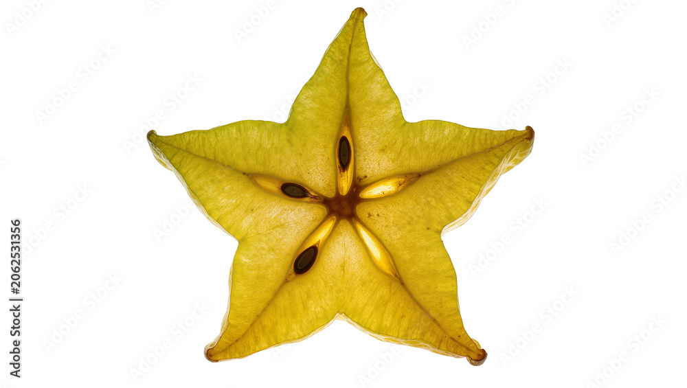 Fototapeta premium Star fruit slice with seeds and translucent flesh