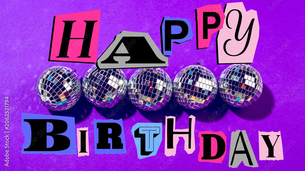 Fototapeta premium Celebration for birthday with colorful letters and shiny disco balls on purple background