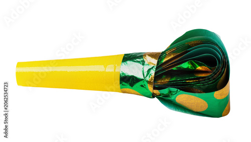 Foto Yellow party horn with green and gold polka dot paper