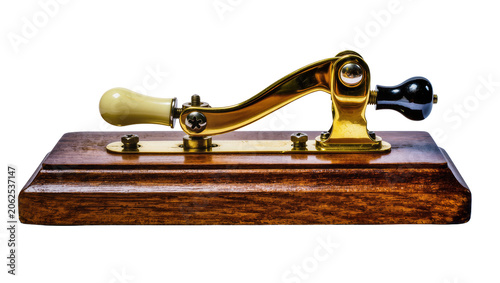 Fotografía Antique brass telegraph key with wooden base and ivory and black knobs