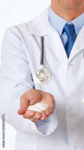 Medical doctor hand holding sugar  with thumb down