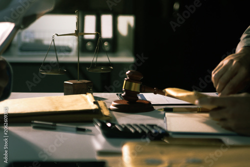 Konstfotografi Consultation and conference of professional businesswoman and Male lawyers working and discussion having at law firm in office