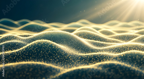 Sunlight shining on wavy sand dunes at sunrise or sunset