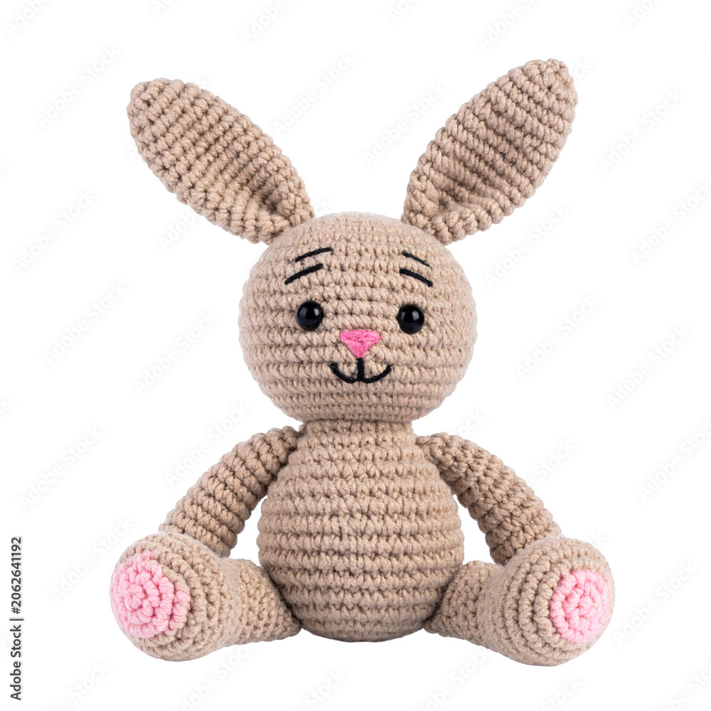 Fototapeta premium Cute knitted toy bunny isolated on transparent or white background