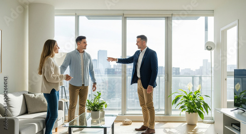 Real estate agent showing apartment to young couple