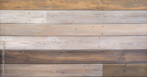 Horizontal wooden planks wall with mixed natural tones