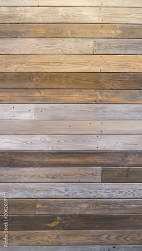 Horizontal wooden plank wall with mixed natural tones