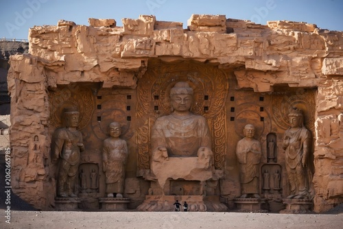 Buddha statues carved in sandstone cliff at Yungang Grottoes, Datong, China