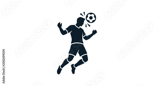 Silhouette of a soccer player heading the ball during a match.