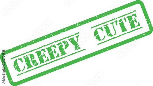 Fotografie A quirky green grunge rubber stamp displays the unusual phrase creepy cute on a