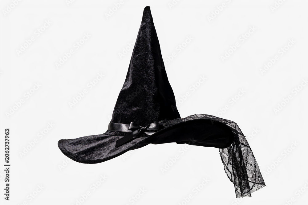 Fototapeta premium Black velvet witch hat with lace veil, pointed halloween costume accessory, dark gothic headwear for masquerade party isolated on white
