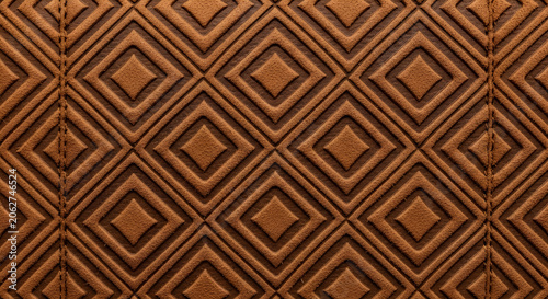 Geometric pattern of brown and black diamonds on a surface