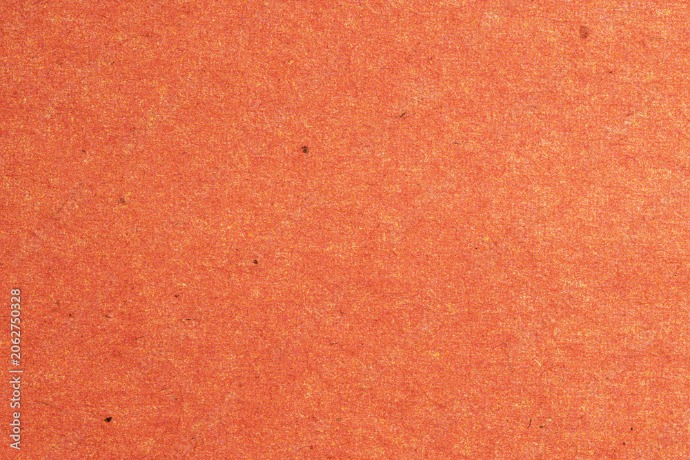 Fototapeta premium Macro Newspaper Print Paper With Orange Ink Texture
