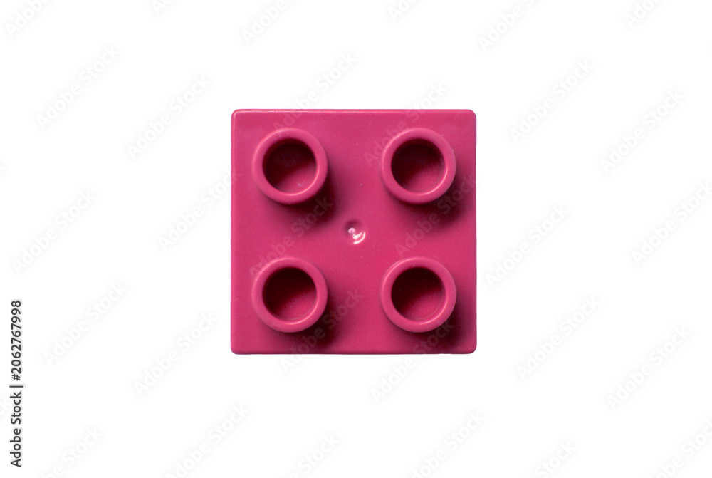 Naklejka premium One Magenta or Dark Pink cube square lego toy brick or block isolated on white. top view