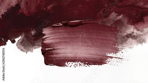 Swirling burgundy paint evokes passion and creativity in abstract art