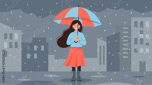 Woman standing under colorful umbrella on snowy city street