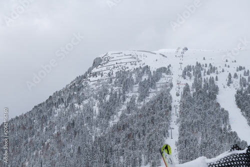 Snowy mountain landscape in Obereggen, South Tyrol, Italy
