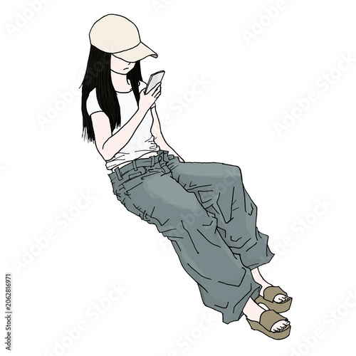 キャップとTシャツとデニムで座ってスマホを見ている女性（col、jpg）