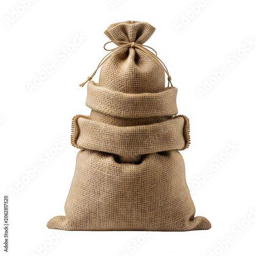 Stacked burlap sacks with twine ties on neutral background