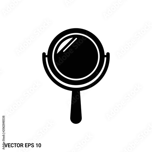 Magnifying glass icon with handle.