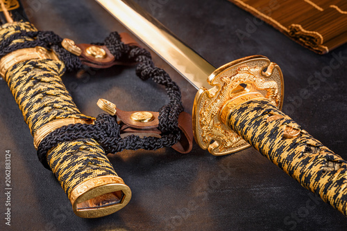 Slika na platnu Japanese samurai katana sword and scabbard close up