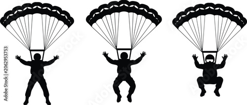 Bild auf Leinwand Three parachutists descending with open parachutes, silhouettes showing differen