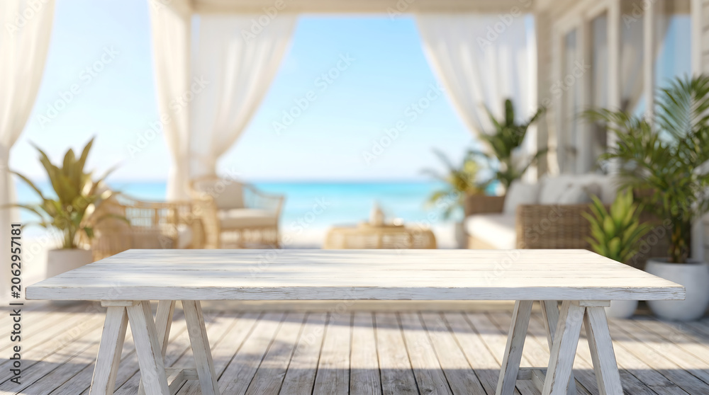 Fototapeta premium Empty white wooden table on beach terrace with blurry ocean background for product display in coastal resort