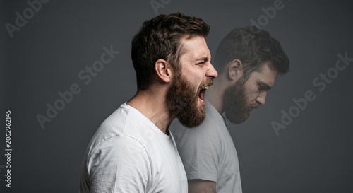 Conceptual side profile of a bearded man screaming with a faded sad double, depicting extreme mood swings, inner conflict, and symptoms of bipolar disorder