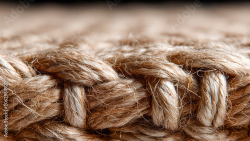 Close-up of hand-woven jute rope texture, natural fiber background and rustic, eco-friendly craft material