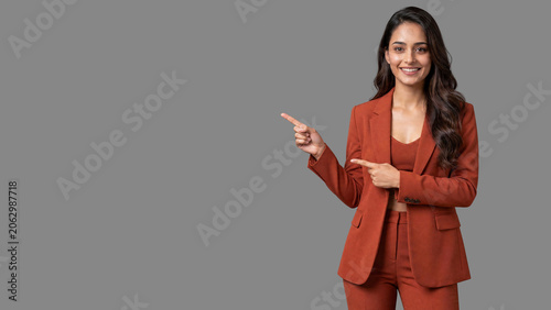 Smiling Indian Businesswoman Pointing At Copy Space For Advertising And Marketing Concept generative ai