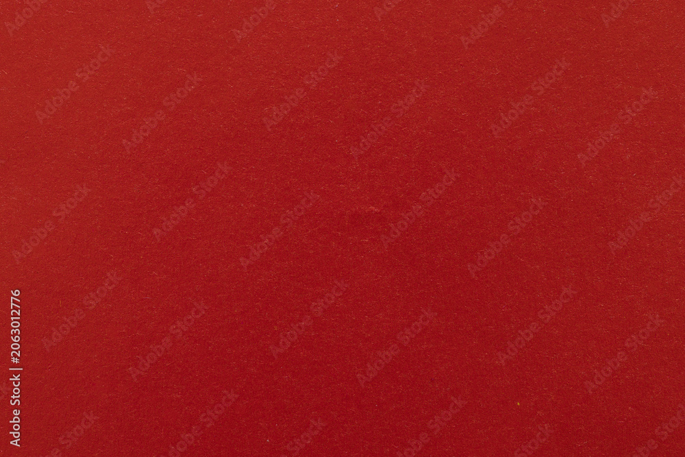 Fototapeta premium Solid Red Paper Texture Background,Macro,A high-quality, close-up texture shot of a solid, deep red paper surface, perfect for use as a minimalist background or graphic design element.