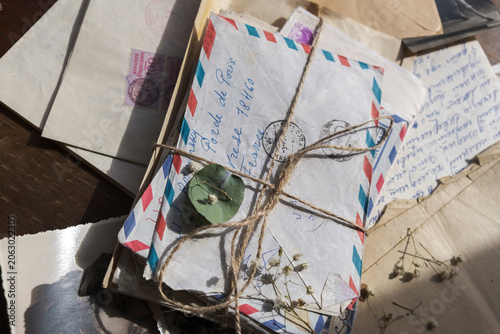 Fotografía Collection of old handwritten airmail letters tied with rustic twine