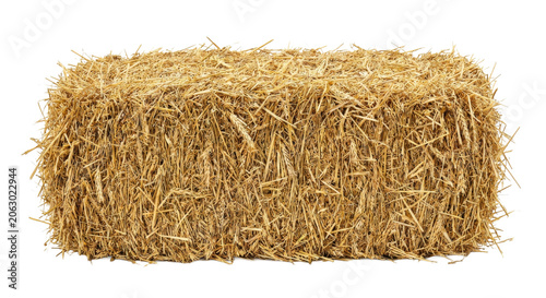 Obraz na plátně Close-up of a large rectangular hay bale isolated on a white background