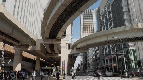 Tokyo Scene  :  Traffic Lights Changing at the Intersection of an Arterial Street, Skyscrapers and Expressway Junctions Intertwining Overhead, Layers of Tokyo  |  Ikebukuro, Tokyo, Japan