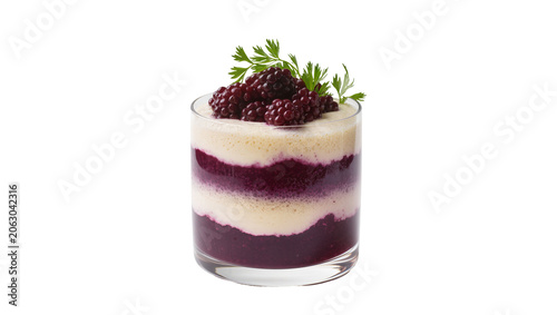 Photos Layered berry dessert with cream and blackberries on top