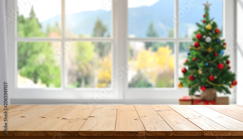 Rustic wooden table top with blurred festive Christmas tree in background, winter holiday decor, seasonal display