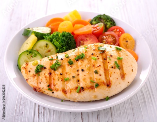 Grilled Chicken Breast Served with Fresh Mixed Vegetables on White Plate