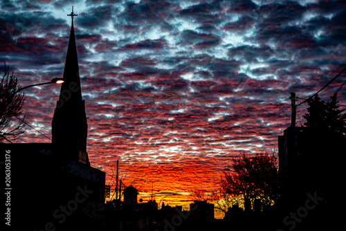 Fiery Autumn Sunset Over Mar del Plata with Catholic Church Silhouette | Argentina