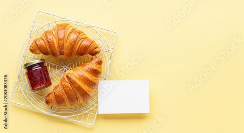 Croissants and jam in packaging.